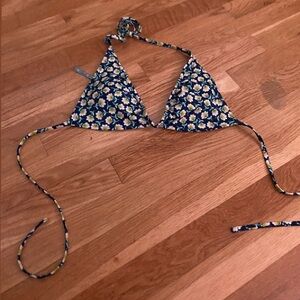 Yellow flowers and blue swimsuit top !!